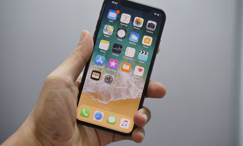 An iPhone displaying an AI assistant interface, representing Apple's decision to open Siri to third-party AI models in iOS 27