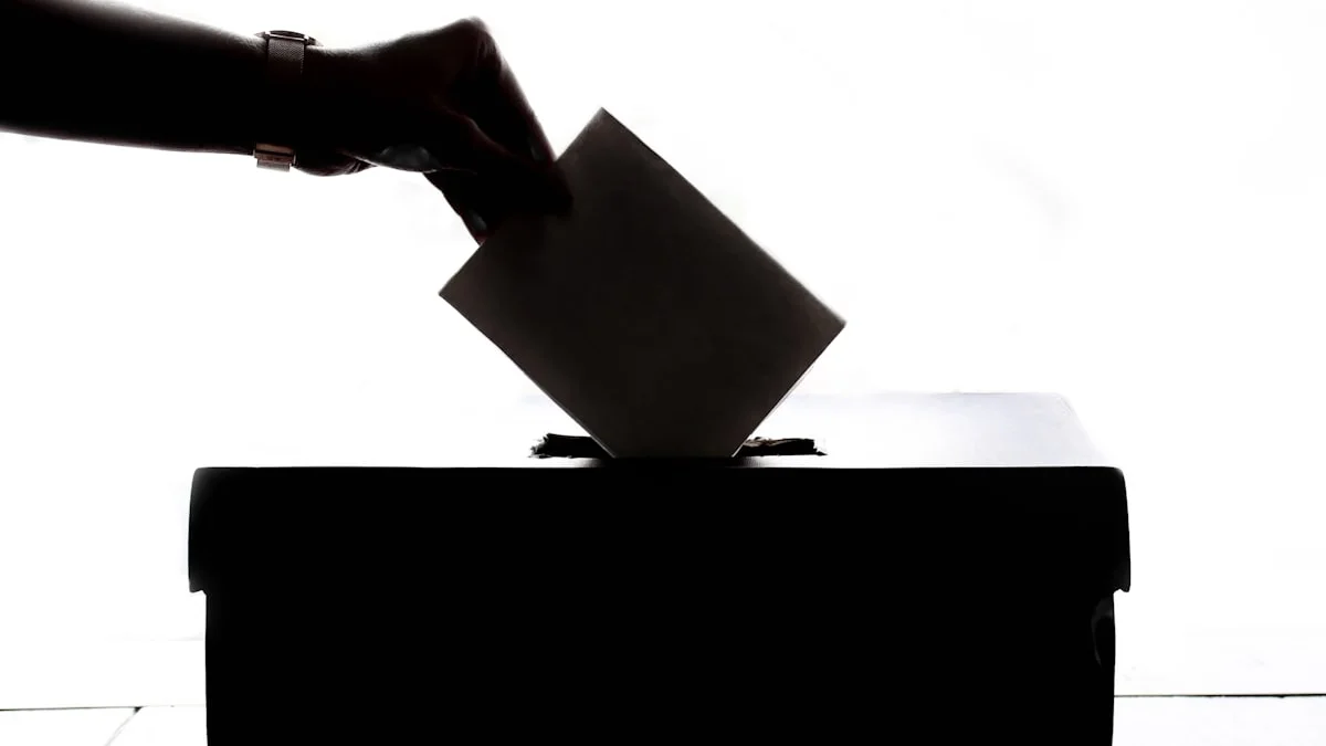 A close-up of electronic voting machine controls, representing election security and digital sovereignty.