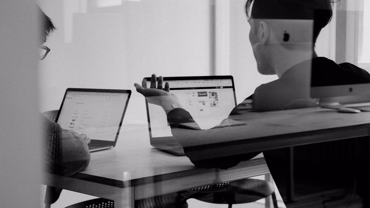 A clean, modern home office setup with multiple monitors and a secure laptop, representing a private workspace.