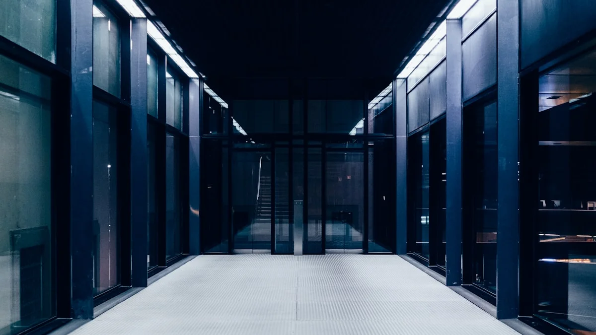 A close-up of server racks with glowing blue lights, representing cloud and chip investment.